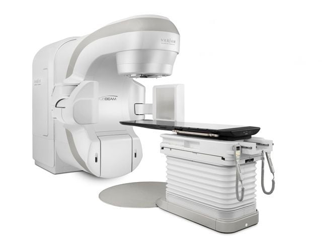 Radiation therapy linear particle accelerator / robotized positioning tables TrueBeam™ Varian Medical Systems