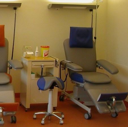 Medical stool / on casters / height-adjustable / saddle seat Relax Bionic Medizintechnik