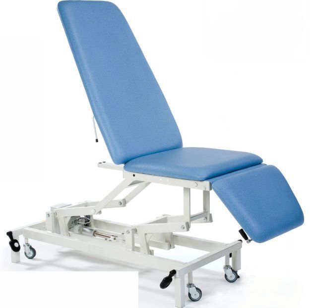 Hydraulic examination table / on casters / height-adjustable / 3-section STREAMLINE™ Merit Akron