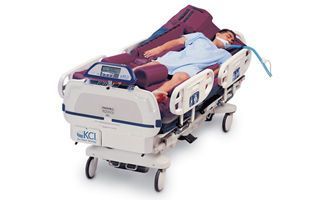Intensive care bed / electrical / height-adjustable / 4 sections TriaDyne Proventa ArjoHuntleigh