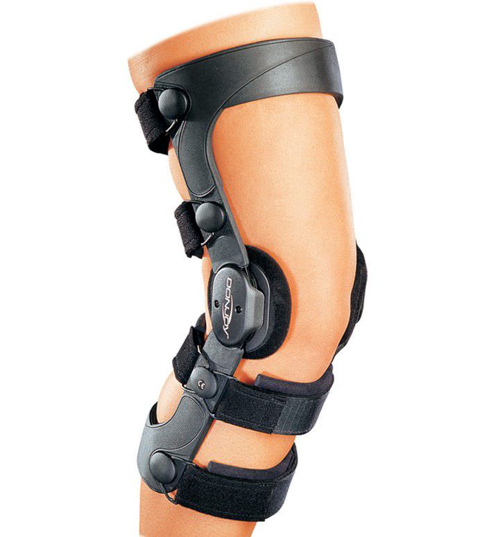Knee orthosis (orthopedic immobilization) / knee ligaments stabilisation / articulated Legend™ DonJoy