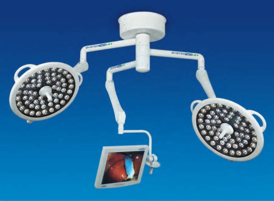 LED surgical light / ceiling-mounted / with video monitor / 3-arm Trio Medical Illumination International