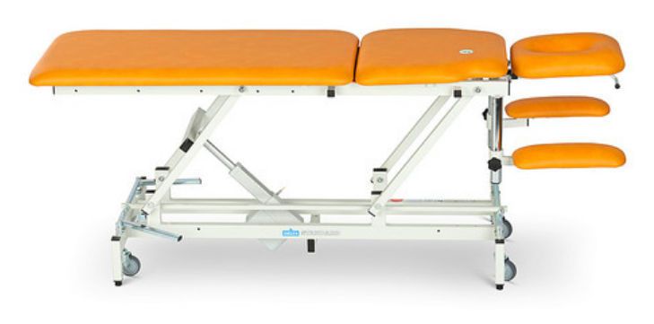 Electrical massage table / on casters / height-adjustable / 2 sections Delta Standard Lojer
