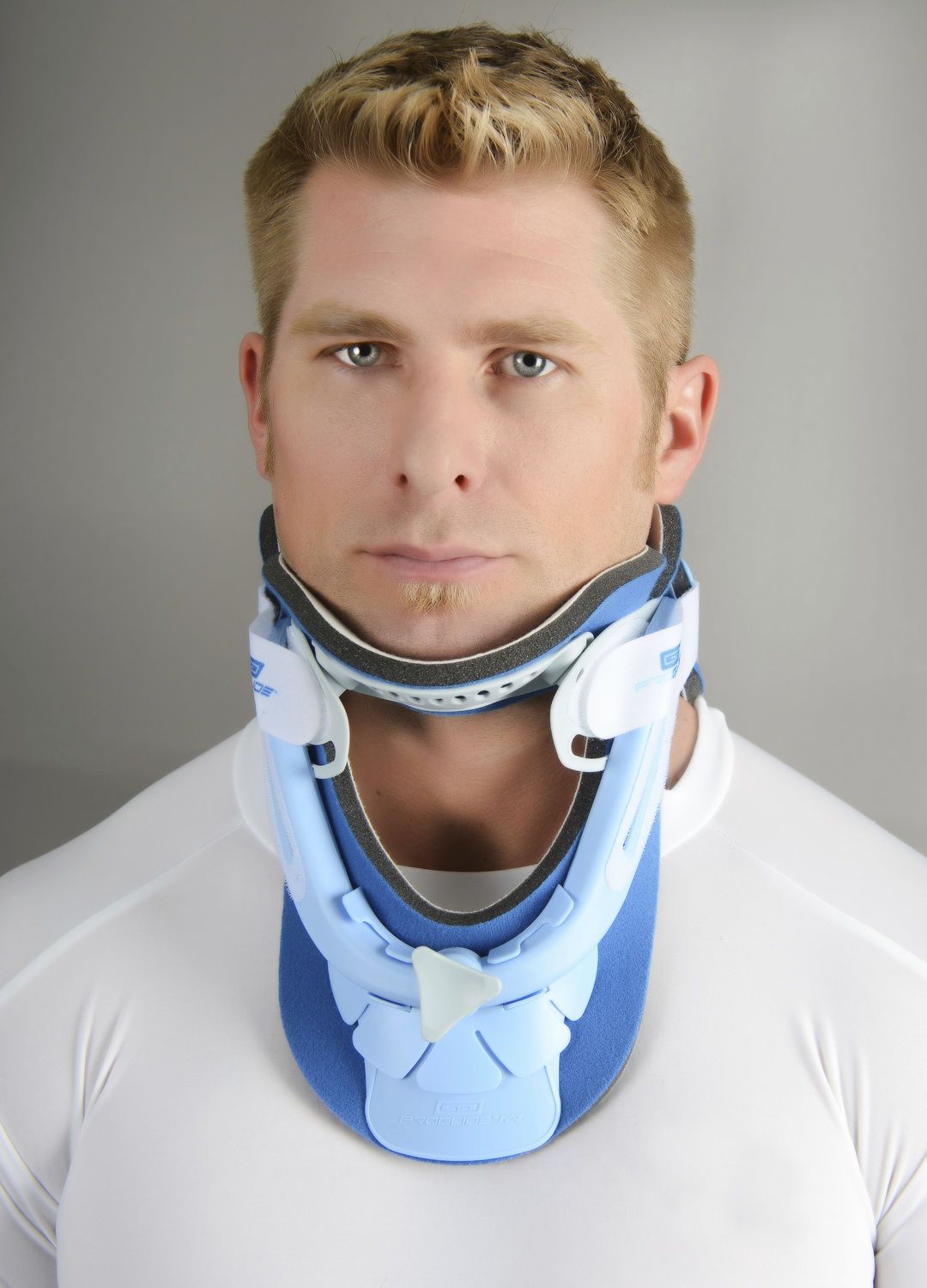 Rigid cervical collar / tracheostomy / with thoracic extension / with chin rest PROGLIDE® 174 Optec USA