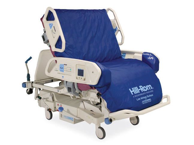 Hospital bed / electrical / height-adjustable / on casters TotalCare® Hill-Rom
